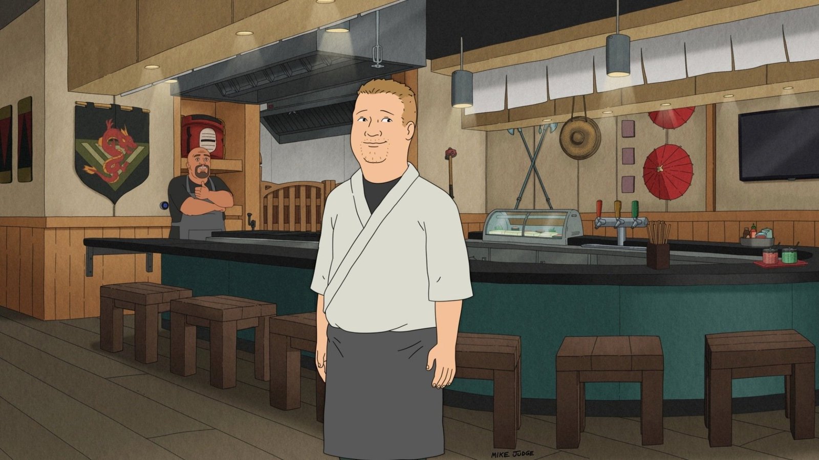 Bobby Hill stands in his restaurant, Robata Chane.