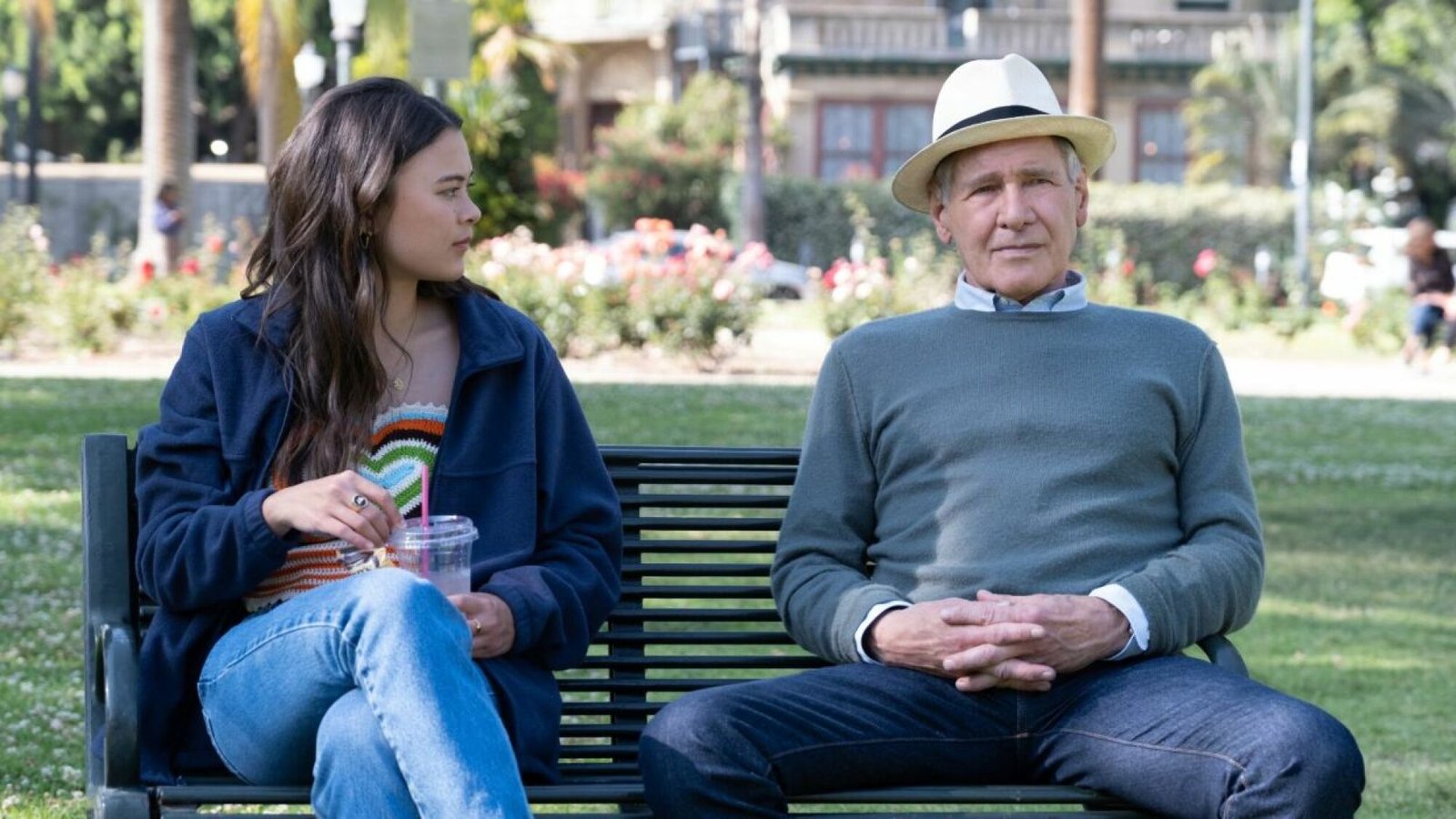 images-10-fill_-size_2000x1125-v1685718862 A young woman and an older man in a fedora sit together on a bench.