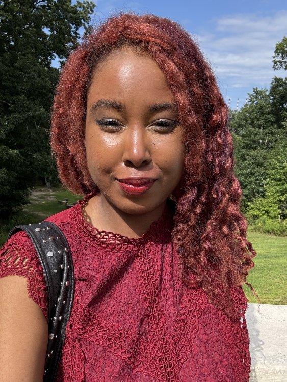 Selfie shot with Pixel 9 Pro XL that features woman with red hair