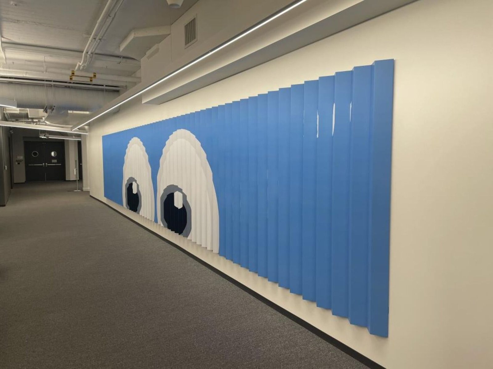 images-13-fill_-size_2000x1500-v1691618018 Seen from one side, the sign looks completely blue and features the eyes emoji looking off to the side.