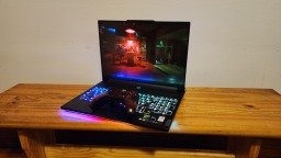 Lenovo Legion 9i on a bench playing Cyberpunk 2077