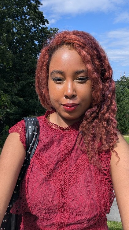 Selfie shot with Pixel 9 Pro XL that features woman with red hair