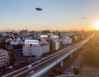 images-7-fit_lim-size_376x-3 adobe firefly generated image of tokyo skyline with flying car